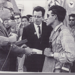 AS WE ENTER SACRAMENTO, WE ARE GREETED  BY THE DEPUTY MAYOR OF SACRAMENTO IN THE ABSENCE OF THE GOVERNOR WHO WAS NOT TO GREET US AND WAS SPENDING EASTER SUNDAY IN PALM SPRINGS WITH FRIENDS! I WAS PRESENTED WITH THE KEY TO THE CITY ON APRIL 10, 1966.