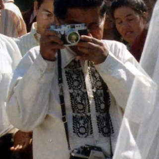 Cesar Chavez and Carlos LeGerrette taking each others photo in Delano 1970.