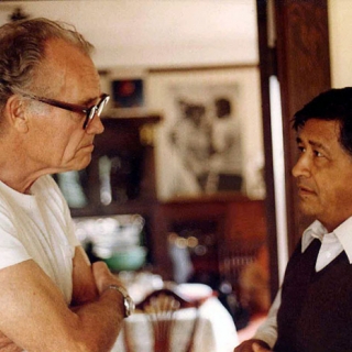 Fred Ross and Cesar Chavez at the offices of United Domestic Workers in San Diego 1980.