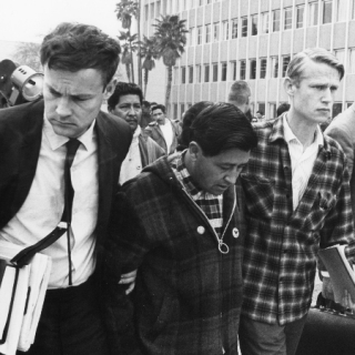 Jerry Cohen & LeRoy Chatfield escort Cesar Chavez from the Kern County Courthouse after Cesar\'s court hearing was postponed.